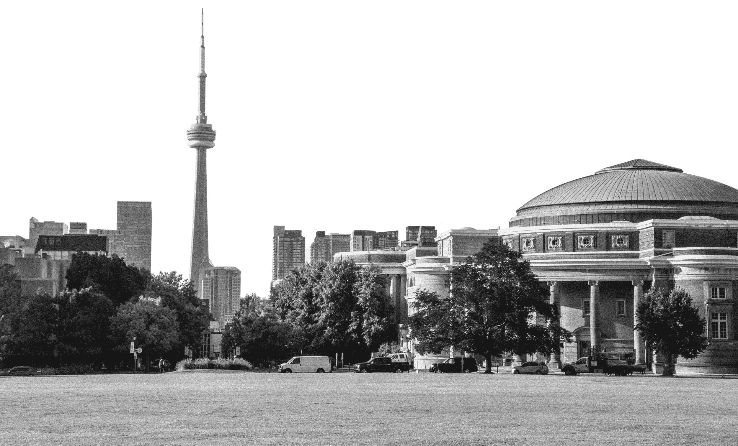 Grainy black and white photo of Convocation Hall, King's College Circle, and the CN tower visible in the background